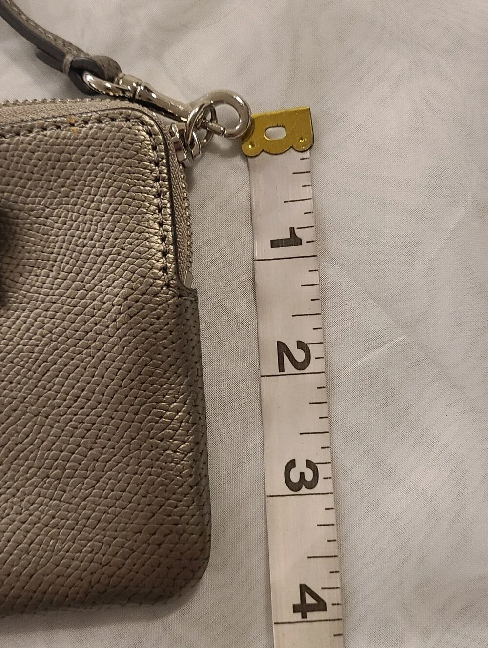 COACH Metallic Silver Leather Wristlet